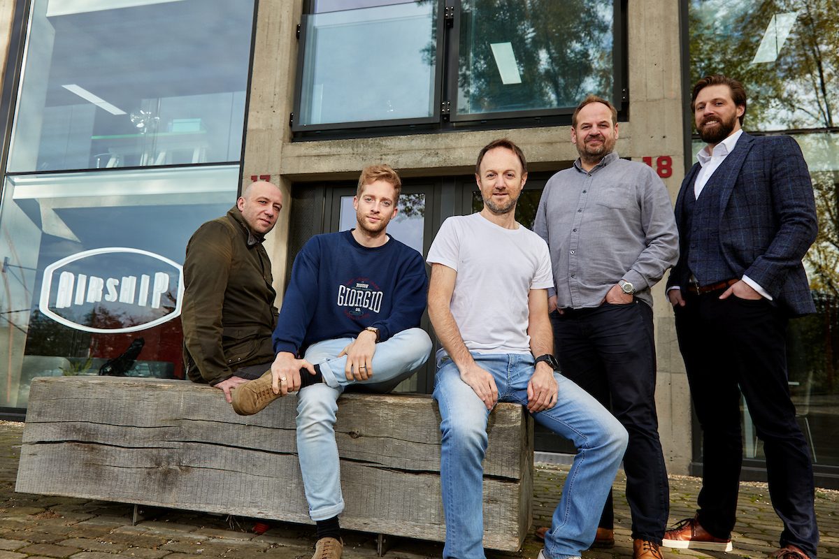 5 men from Airship Services Ltd gathered outside of their office building