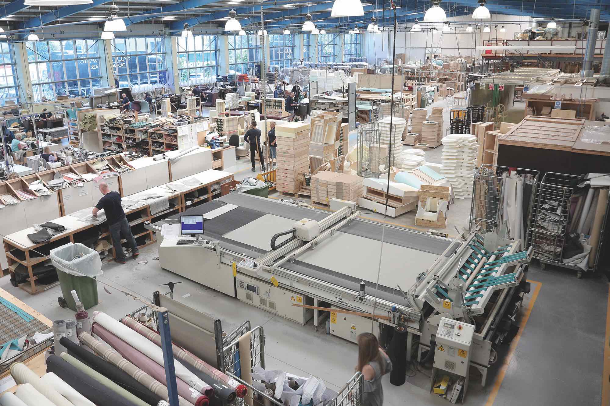 View from height of the factory floor at Shackletons furniture manufacturers, showing workers and machinery