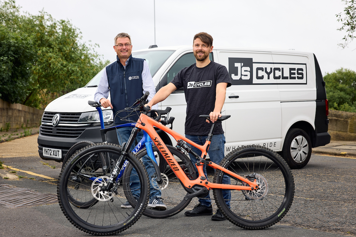 J's Cycle Shack with Andy Clough in front of van